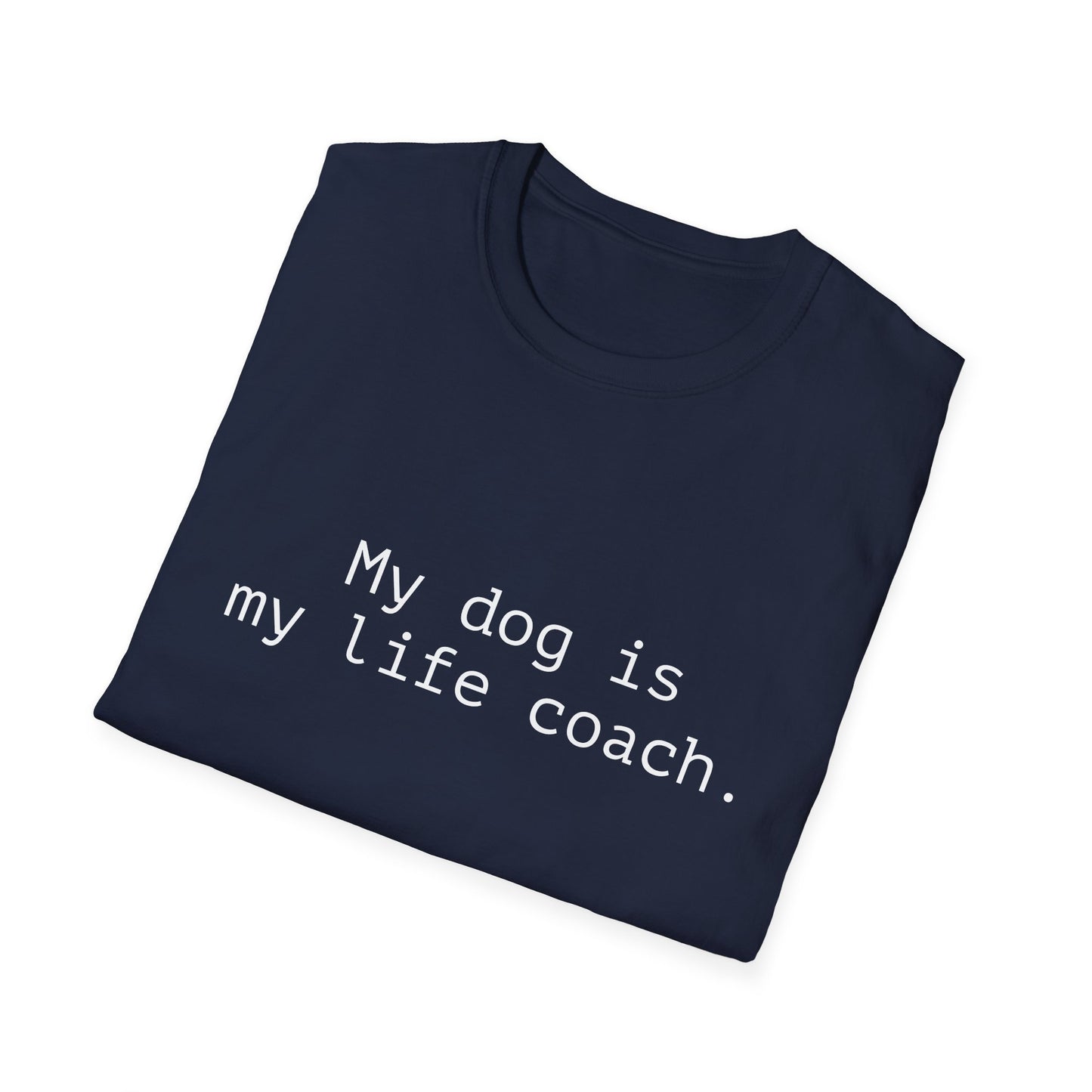 Folded navy blue t-shirt with 'My dog is my life coach' text on a white background