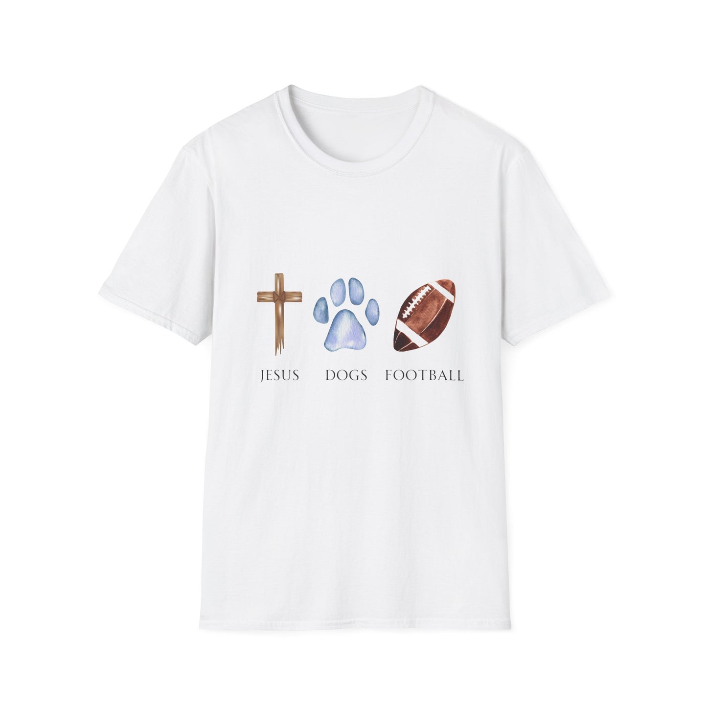 A person wearing a grey unisex t-shirt with graphics of a cross, a dog paw, and a football on it, standing on a field.
