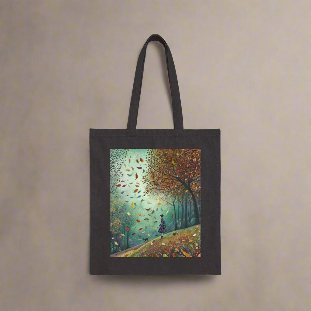 Black tote bag with a colorful autumn scene design
