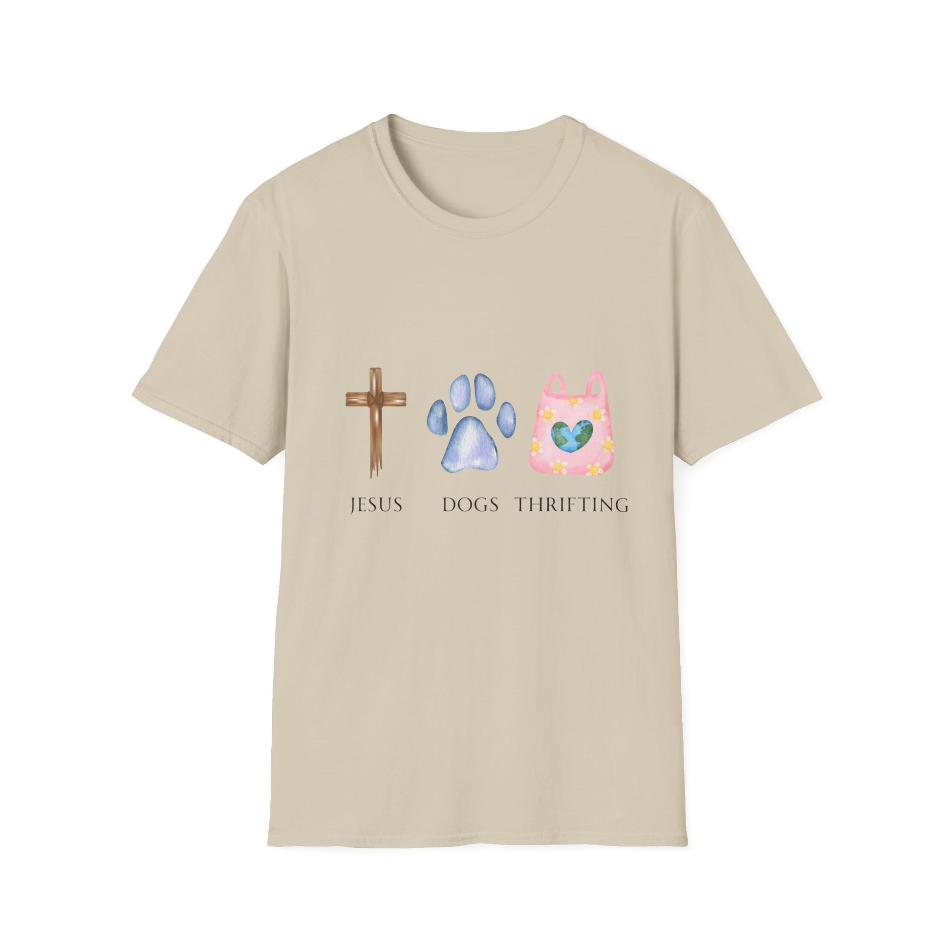 A woman standing in front of a Thrift store wearing a gray t-shirt with text and graphics related to Jesus, dogs, and thrifting.