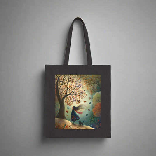 Black tote bag with a colorful autumn scene featuring a person and dog.