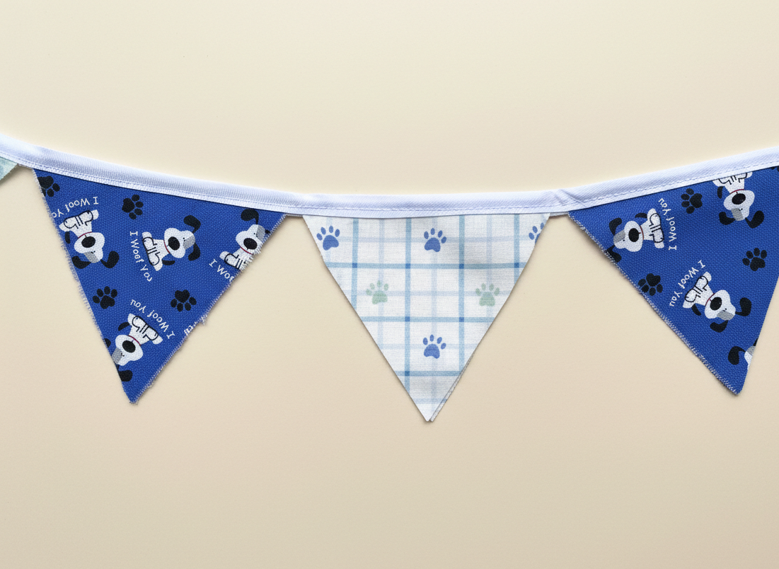 Fabric banner with blue and white checkered pattern on a beige background