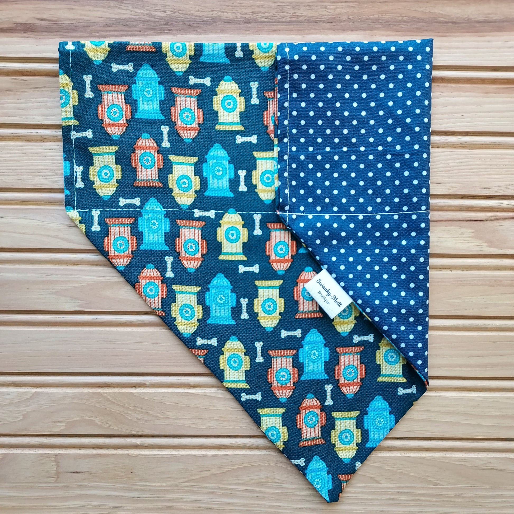 Reversible, slide over the collar dog bandana with fire hydrants and Dots.