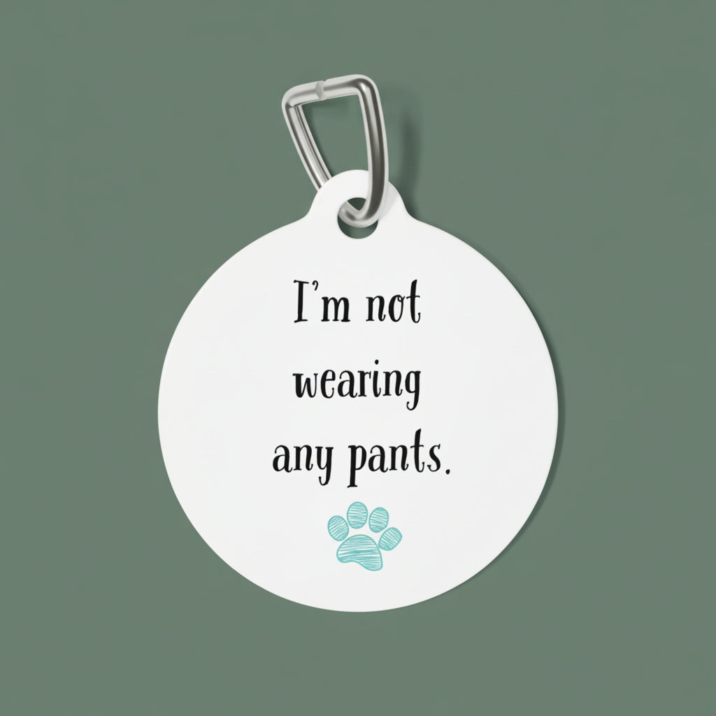 Round pet tag with text 'I'm not wearing any pants.' and a paw print on a white background