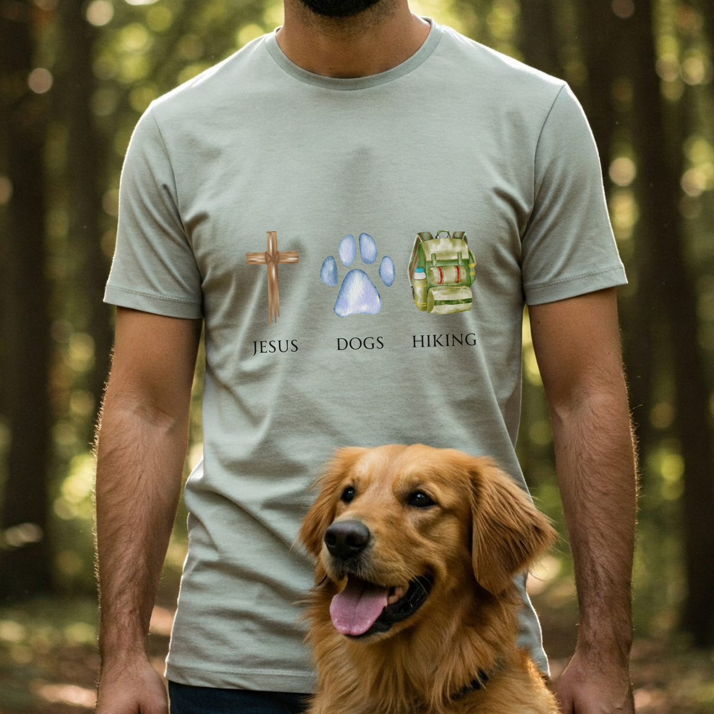 Man wearing a t-shirt with 'Jesus', 'Dogs', and 'Hiking' design in a forest setting.