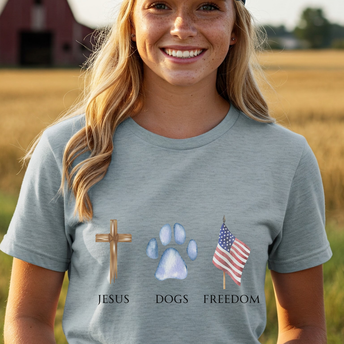 Woman wearing a t-shirt with Jesus, Dogs, and Freedom. American Flag
