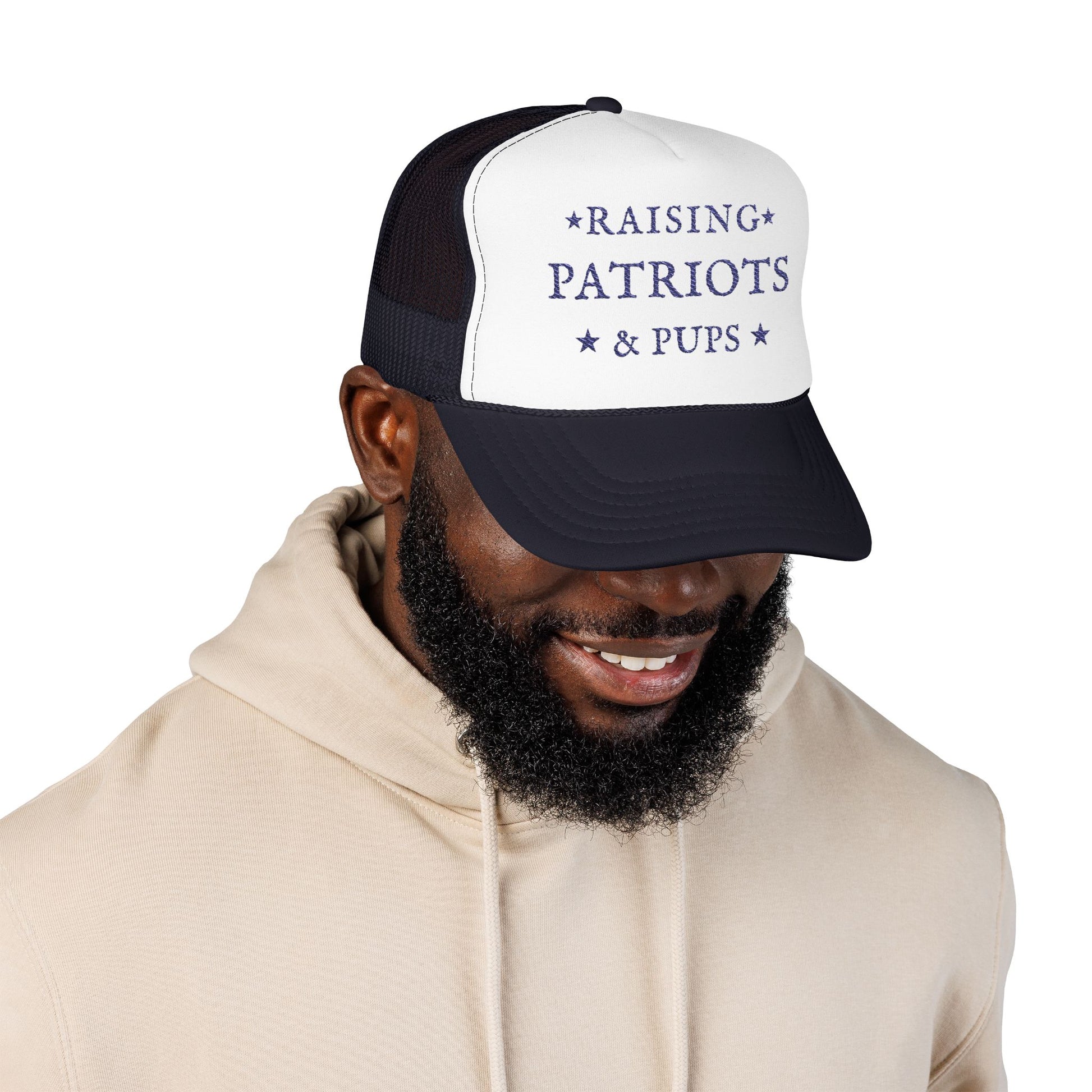 Man wearing a navy and white cap with a logo, on a white background