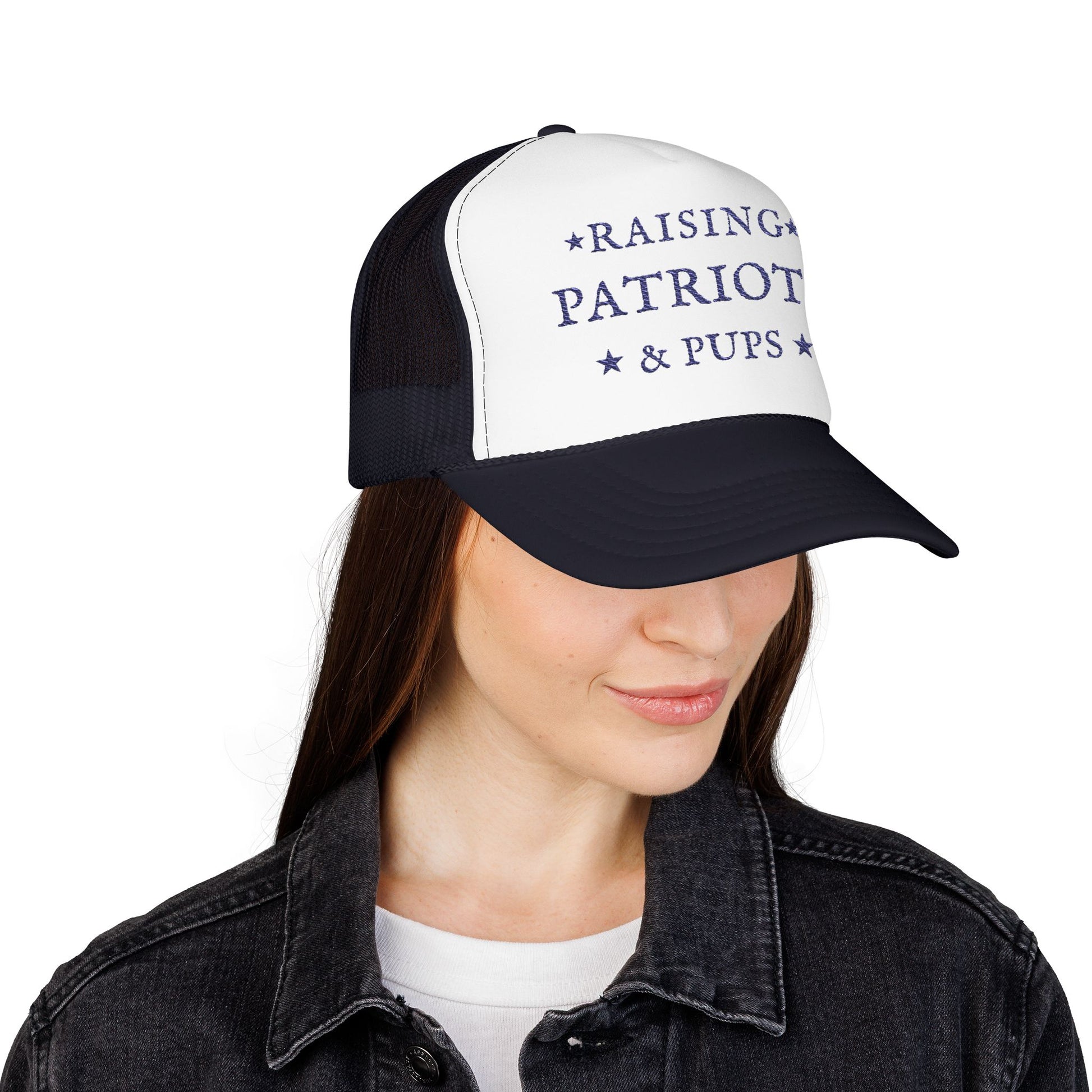 Person wearing a cap with 'Raising Patriots and Pups' text and logo on a white background
