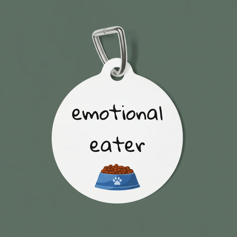 Pet tag with 'emotional eater' text and a bowl icon on a white background