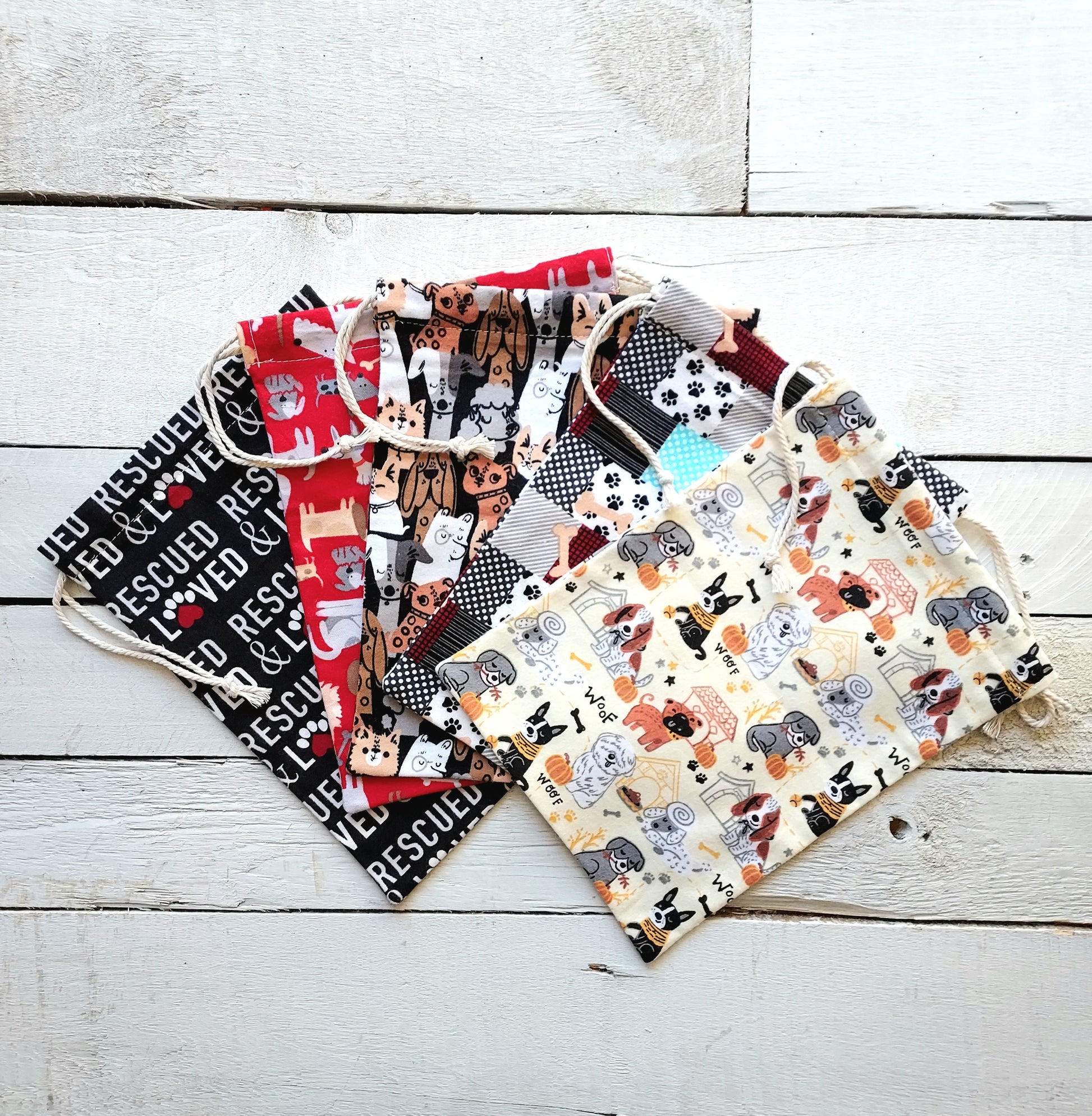 Collection of patterned bags on a wooden surface